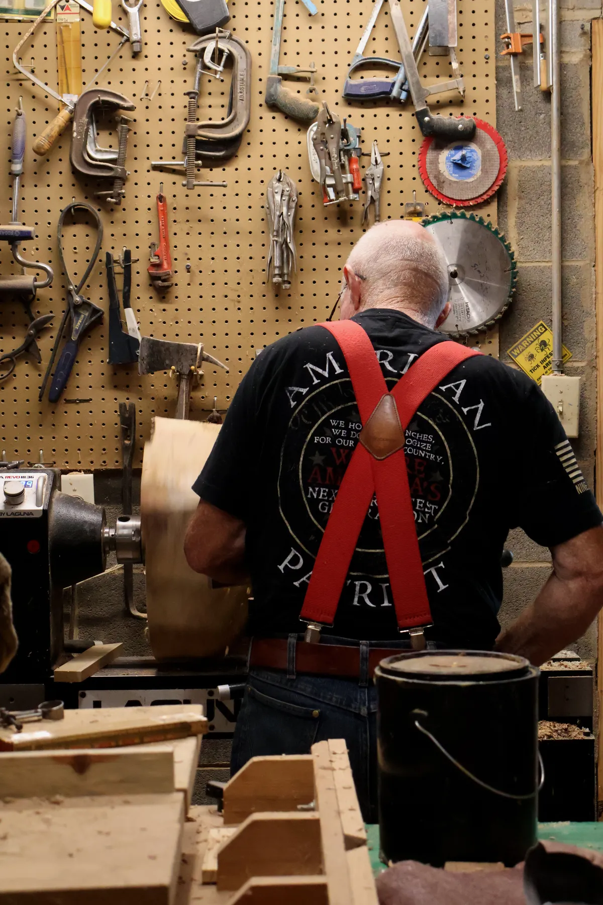 Sims Slabs woodworker Mark turning a bowl on the lathe in workshop