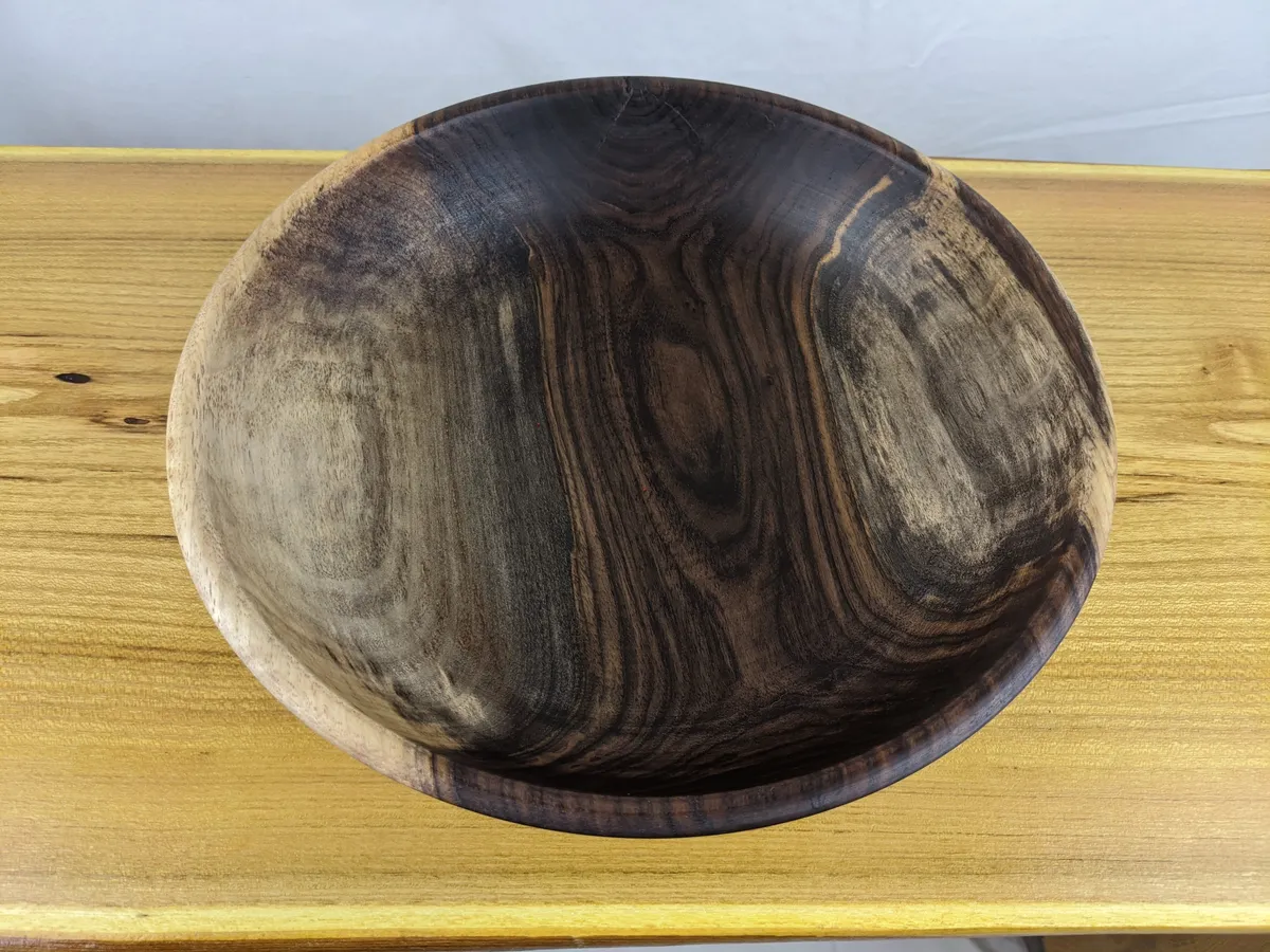 Hand-turned walnut bowl with rich dark grain